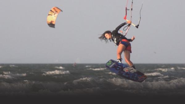 Woman kitesurfing