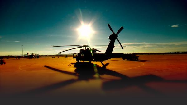 Helicopter at a desert base