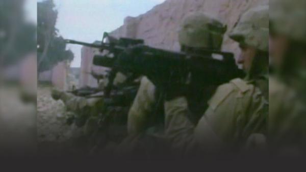 American soldiers with machine guns in Iraq