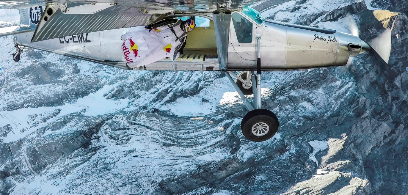 The Soul Flyers wingsuit pilots fly into a plane Wingsuit pilot flies into a plane