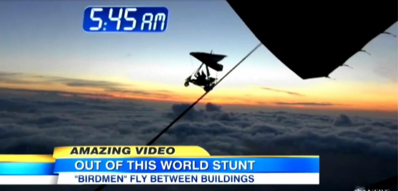 Wingsuit pilots Ludovic Woerth and Jokke Sommer fly between buildings in Rio De Janeiro Brazil Wingsuit pilot flies between two buildings