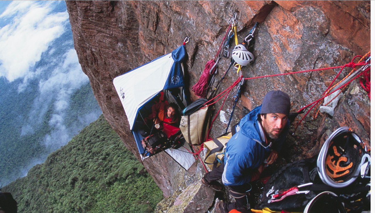 Climbers camp out on a cliff Climbers
