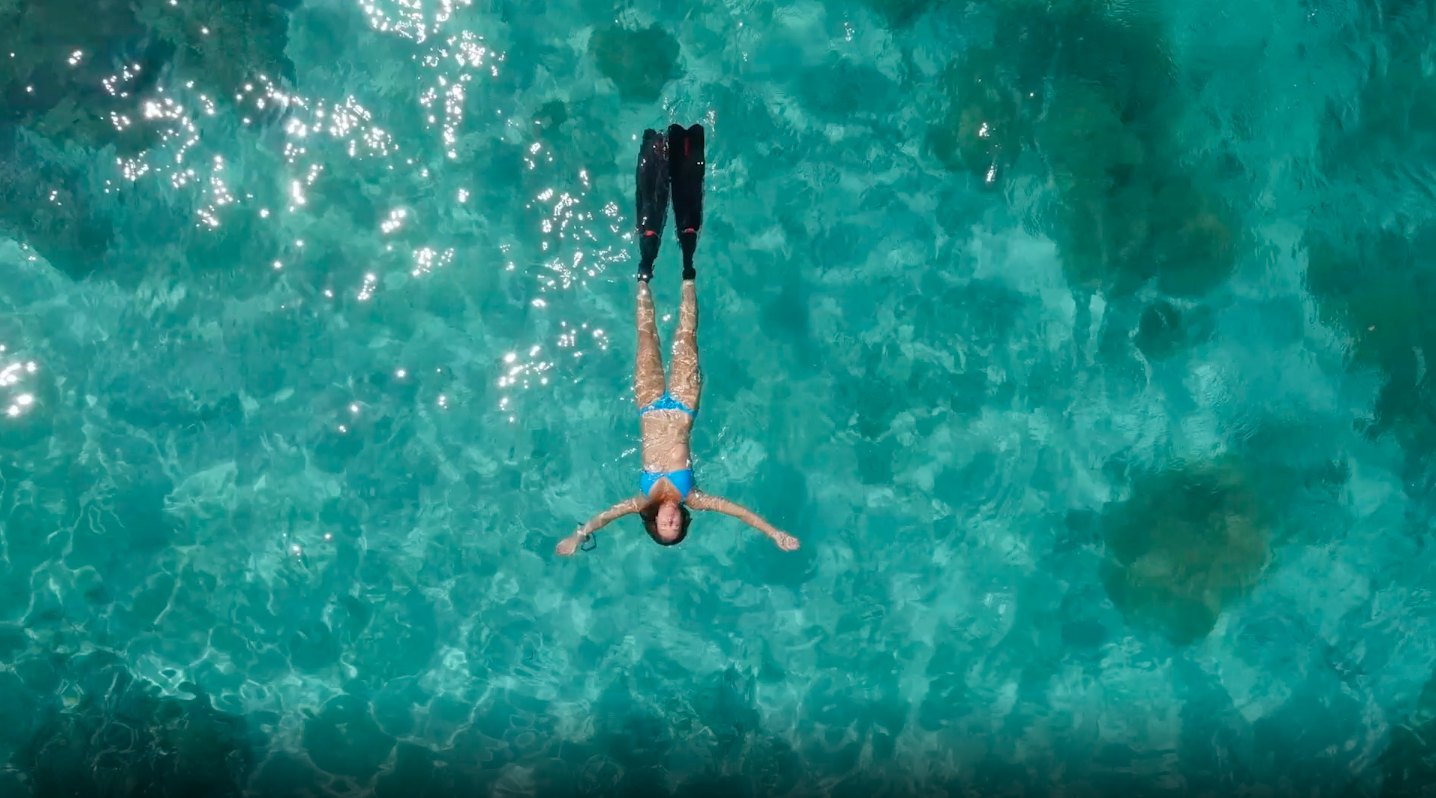A Russian freediver is about to scout the Great Barrier Reef Woman swimming in ocean