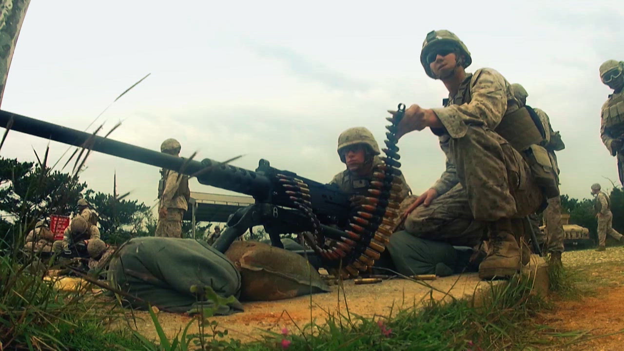 Camouflage Makeup, a Machine Gun, and an Amphibious Military ATV