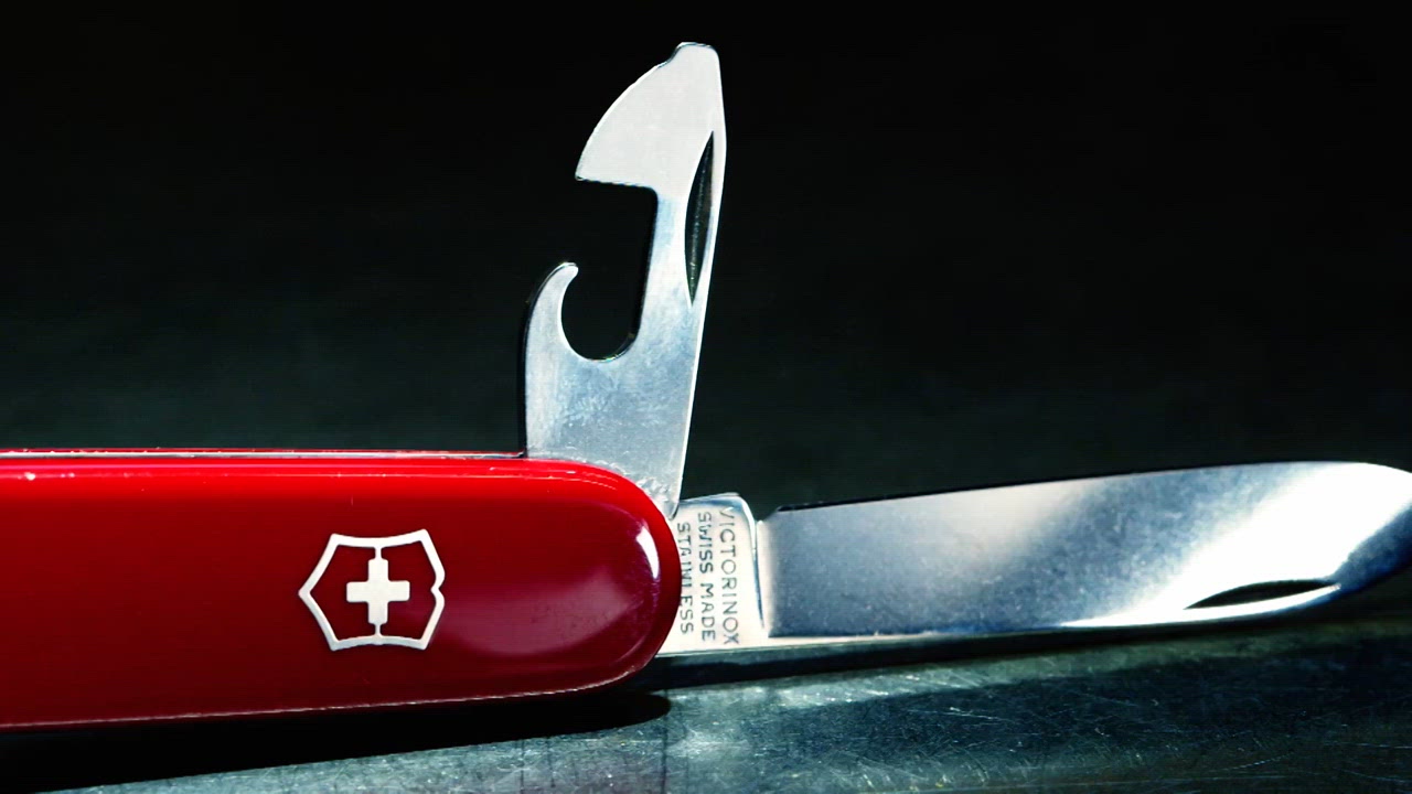 Swiss Army Knife, a Sub-Machine Gun, Body Armor, and a Laser Sight