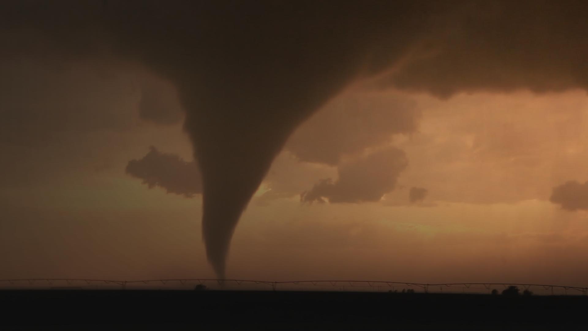 Tornado spout on the horizon