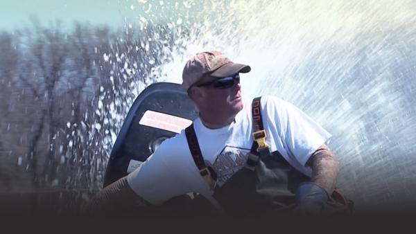 A man in a boat.