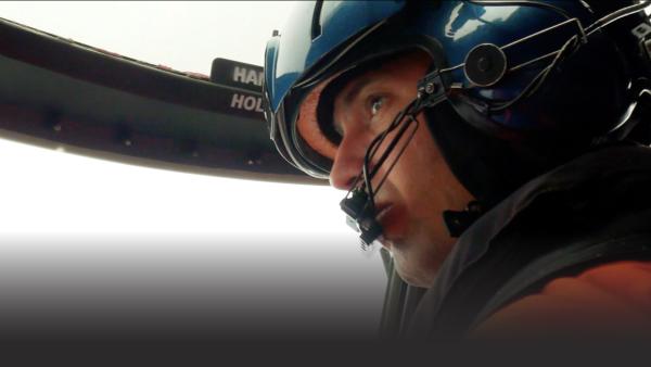 Close up of man in a helicopter