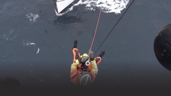 Man propelling down to sea