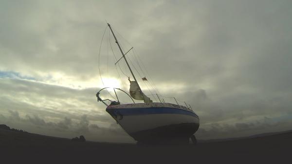 A sailboat is hight and dry