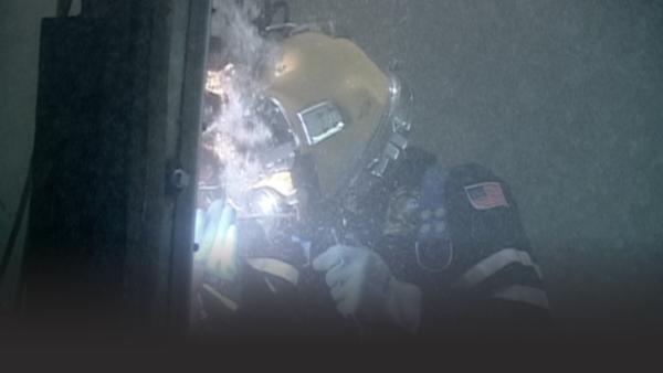 Hazard diver welding underwater 
