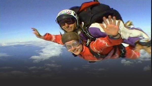 Man and woman skydiving