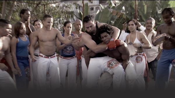 Chris Crudelli practicing Capoeira in Brazil