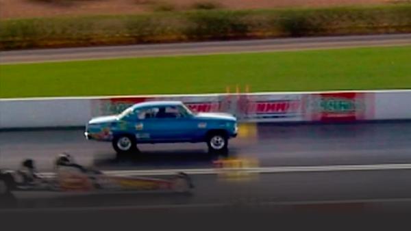 Dragsters approach the finish line