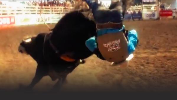 Bull rider flips out