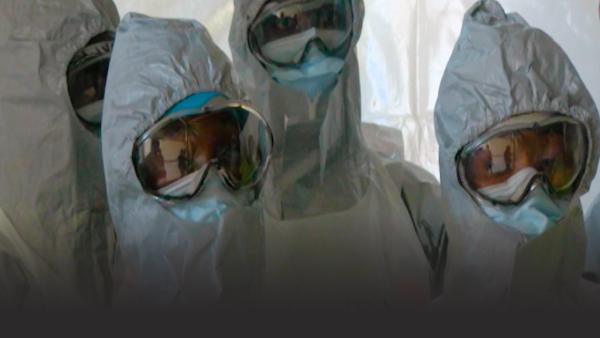 Doctors in Hazmat suits