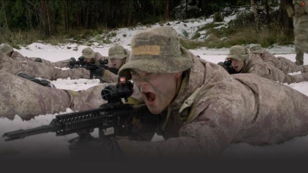 Soldiers shooting in snow