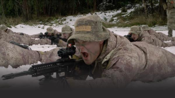 Soldiers shooting in snow