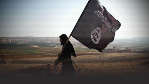 Isis terrorist with flag