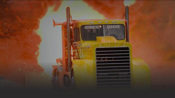 Truck with fire behind it