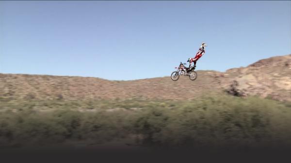 Todd Potter with both legs soaring through the air.