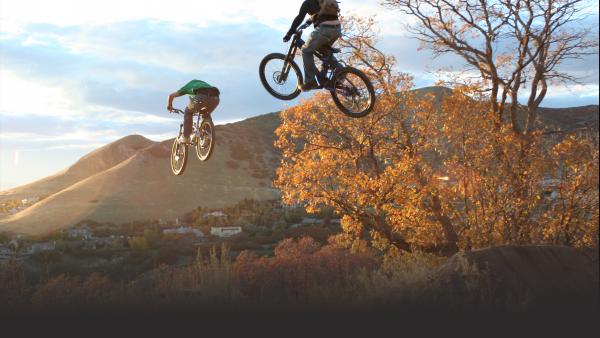 Mountain bikers jumping in British Columbia