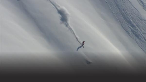 Pro heli skier makes her way down the dangerous slopes of Noway