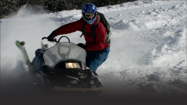 Pro Snowmobiler rides his way down the steep slopes Montana has to offer.