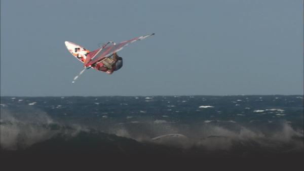 Wind sailing high in the air. 