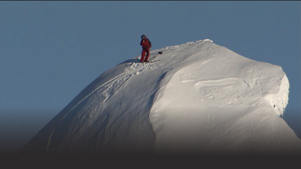 Skier on a mountain top