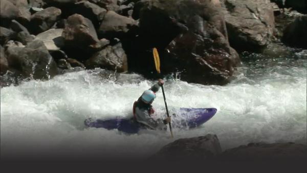 The team kayaks through the rough narrow gorges of the Onot River.