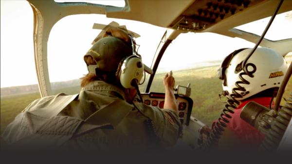 Two men in a helicopter