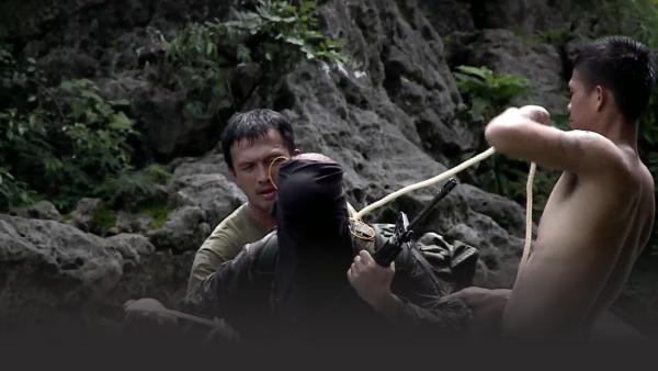 Special Forces recruit being blindfolded in a training exercise in the Philippines