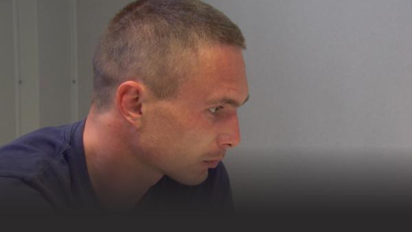 Man under suspicion being questioned